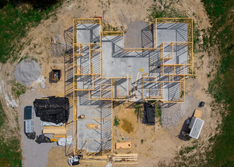 Overhead view of custom home framing on the foundation slab