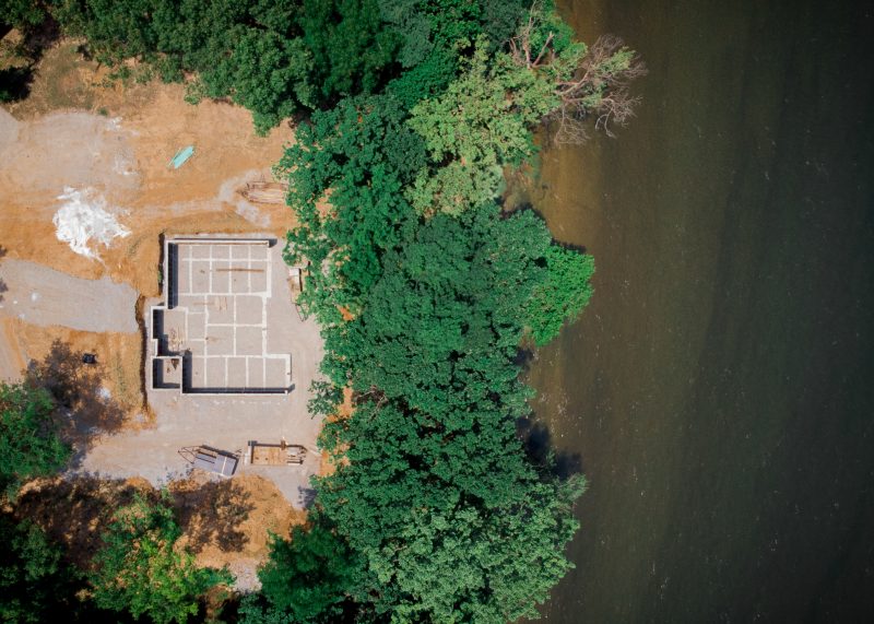Aerial view of a lakeside custom home foundation