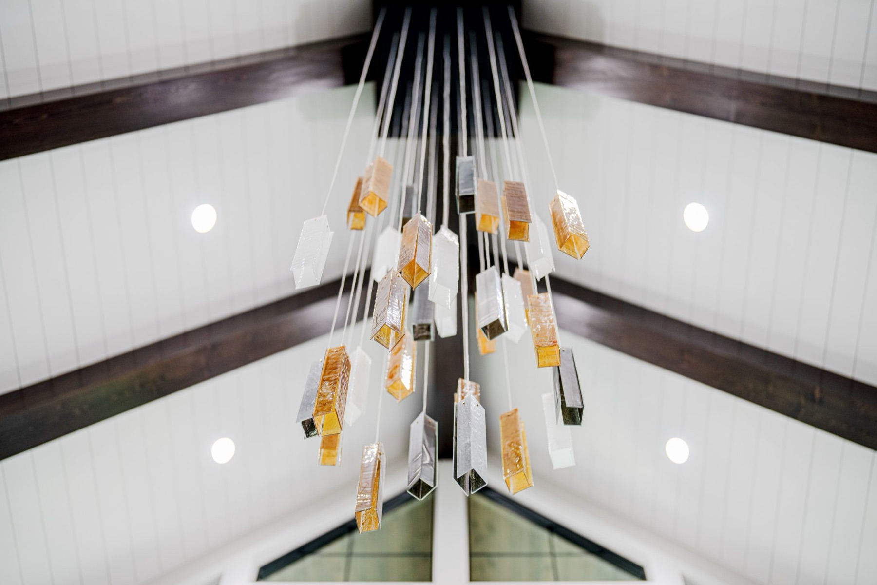 Hand-blown glass pendant chandelier detail in a custom home