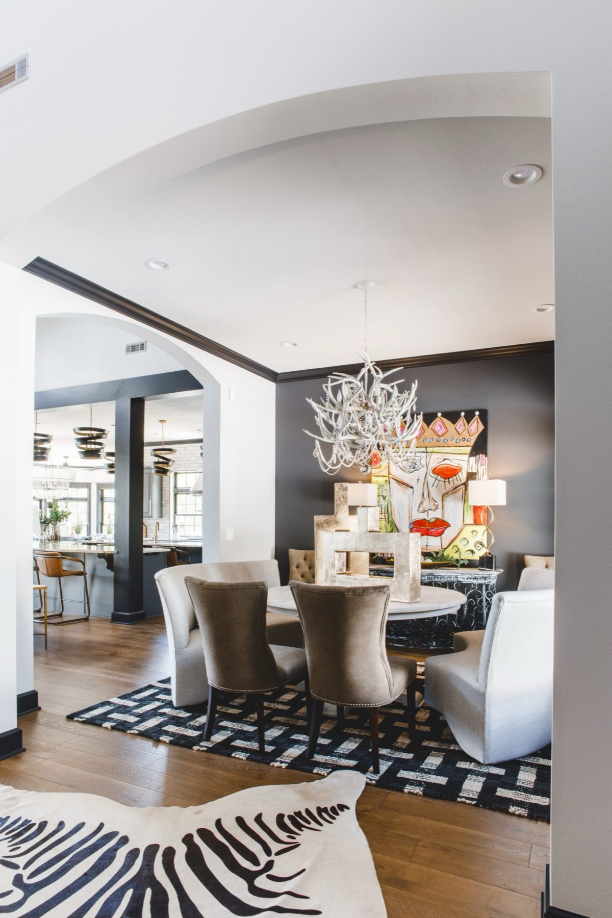 Custom dining room with antler chandelier and designer finishes